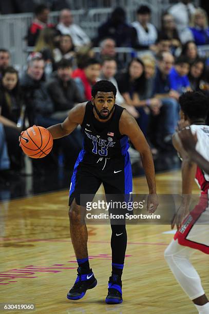 Duke Blue Devils guard Matt Jones dribbles the ball up-court against the UNLV Rebels in the first half of their NCAA college basketball game on...