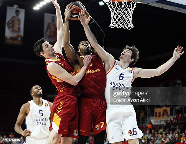 Alex Tyus, #7 of Galatasaray Odeabank Istanbul competes with Cedi Osman, #6 of Anadolu Efes Istanbul during the 2016/2017 Turkish Airlines EuroLeague...