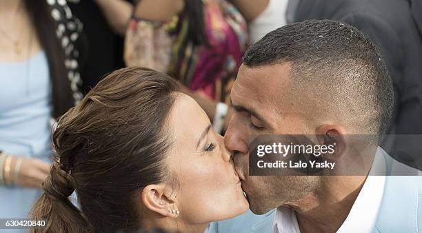 Vanesa Mansilla and Carlos Tevez leave the San Isidro City Hall after their civil wedding ceremony on December 22, 2016 in Buenos Aires, Argentina.