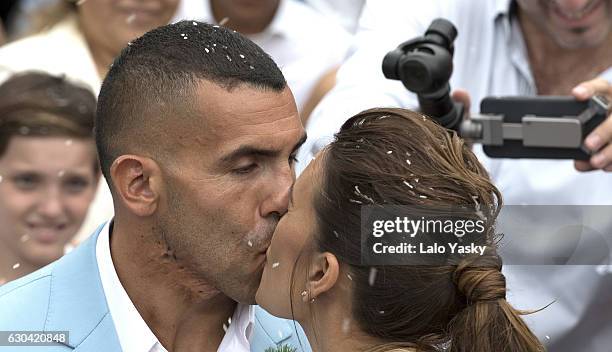 Vanesa Mansilla and Carlos Tevez leave the San Isidro City Hall after their civil wedding ceremony on December 22, 2016 in Buenos Aires, Argentina.