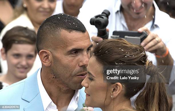 Vanesa Mansilla and Carlos Tevez leave the San Isidro City Hall after their civil wedding ceremony on December 22, 2016 in Buenos Aires, Argentina.