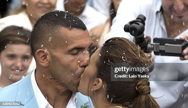 Vanesa Mansilla and Carlos Tevez leave the San Isidro City Hall after their civil wedding ceremony on December 22, 2016 in Buenos Aires, Argentina.