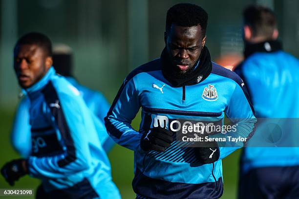 Cheick Tiote warms up during Newcastle United Training Session at The Newcastle United Training Centre on December 22, 2016 in Newcastle upon Tyne,...