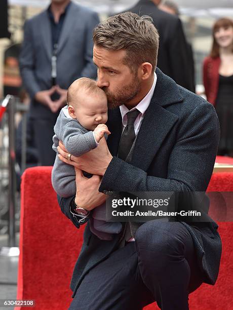 Actor Ryan Reynolds and daughter Ines Reynolds attend the ceremony honoring Ryan Reynolds with a Star on the Hollywood Walk of Fame on December 15,...