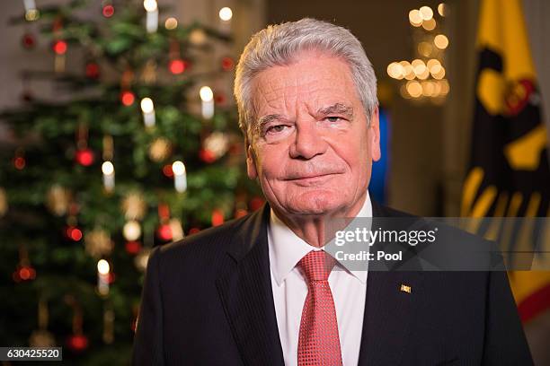 German President Joachim Gauck poses for a photo after he recorded his annual Christmas television address to the nation on December 22, 2016 in...