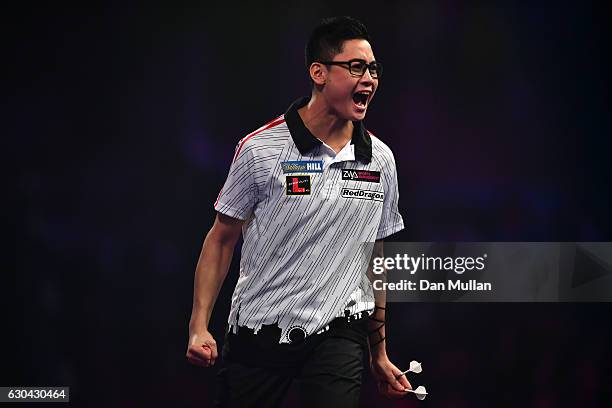 Rowby-John Rodriguez of Austria reacts during his first round match against Dave Chisnall of England on day eight of the 2017 William Hill PDC World...