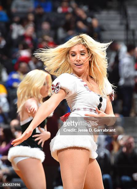 Member of the Brooklynettes dance team performs against the Golden State Warriors on December 22,2016 at Barclays Center in Brooklyn, New York. NOTE...