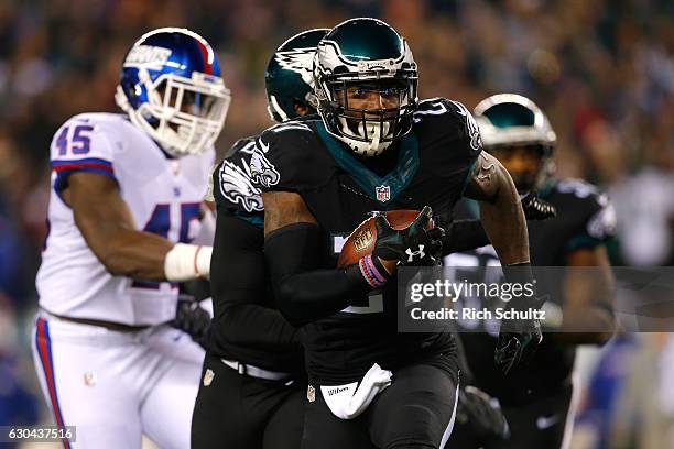 Strong safety Malcolm Jenkins of the Philadelphia Eagles intercepts a ball intended for tight end Will Tye of the New York Giants thrown by...