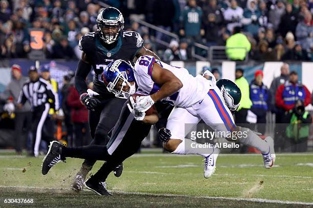 Wide receiver Sterling Shepard of the New York Giants scores a 13 yard touchdown against the Philadelphia Eagles during the second quarter of the...