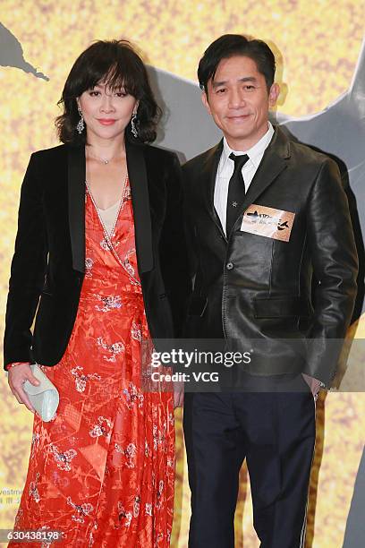 Actor Tony Leung Chiu Wai and his wife actress Carina Lau attend the charity premiere of director Zhang Jiajia's film "See You Tomorrow" on December...
