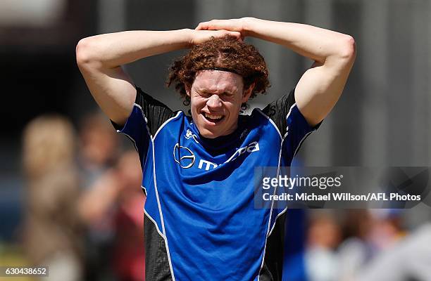 Ben Brown of the Kangaroos recovers during a North Melbourne Kangaroos AFL training session at Arden Street on December 23, 2016 in Melbourne,...