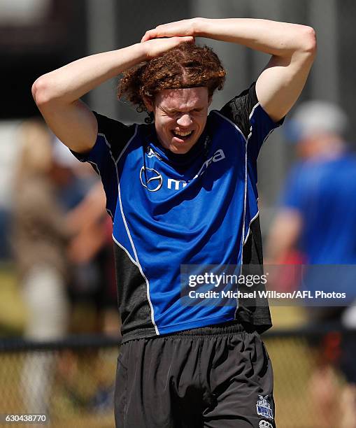 Ben Brown of the Kangaroos recovers during a North Melbourne Kangaroos AFL training session at Arden Street on December 23, 2016 in Melbourne,...