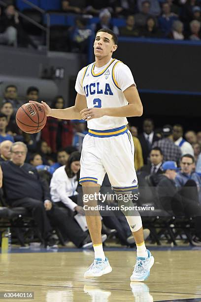 Guard Lonzo Ball brings the ball up the court during an NCAA basketball game between the Western Michigan Broncos and the UCLA Bruins on December 21...