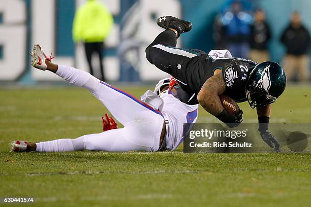 Running back Ryan Mathews of the Philadelphia Eagles runs the ball against cornerback Dominique Rodgers-Cromartie of the New York Giants during the...