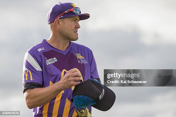 Peter Fulton of the Kings signs autographs during the McDonalds Super Smash T20 match between Canterbury Kings and Otago Volts at Hagley Oval on...