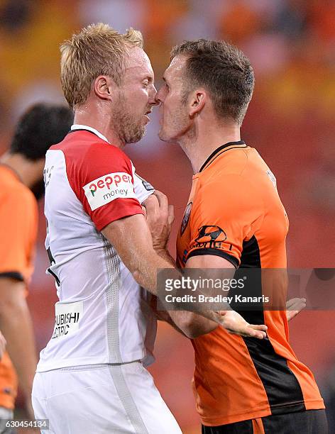 Luke DeVere of the Roar and Mitch Nichols of the Wanderers face off as tempers flare during the round 22 A-League match between Brisbane Roar and...