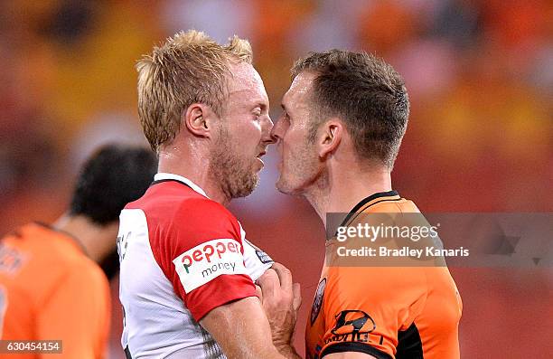 Luke DeVere of the Roar and Mitch Nichols of the Wanderers face off as tempers flare during the round 22 A-League match between Brisbane Roar and...