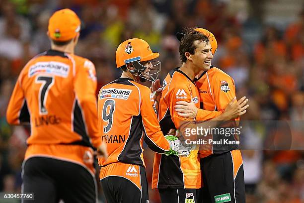 Ashton Agar of the Scorchers celebrates after dismissing Chris Jordan of the Strikers during the Big Bash League between the Perth Scorchers and...