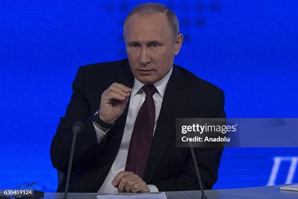 Russia's President Vladimir Putin speaks during his annual end-of-year news conference at Moscow's World Trade Centre in Moscow, Russia, on December...