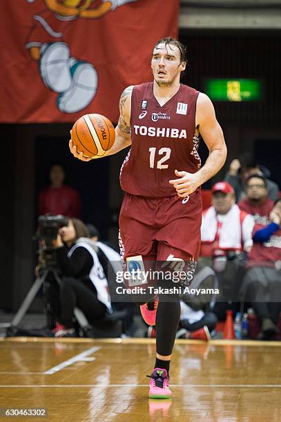 Ryan Spangler of the Kawasaki Brave Thunders dribbles the ball during the B. League match between Toshiba Kawasaki Brave Thunders and Alvark Tokyo at...