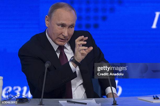 Russia's President Vladimir Putin speaks during his annual end-of-year news conference at Moscow's World Trade Centre in Moscow, Russia, on December...