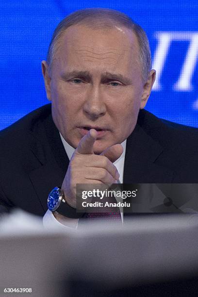 Russia's President Vladimir Putin speaks during his annual end-of-year news conference at Moscow's World Trade Centre in Moscow, Russia, on December...