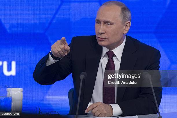 Russia's President Vladimir Putin speaks during his annual end-of-year news conference at Moscow's World Trade Centre in Moscow, Russia, on December...