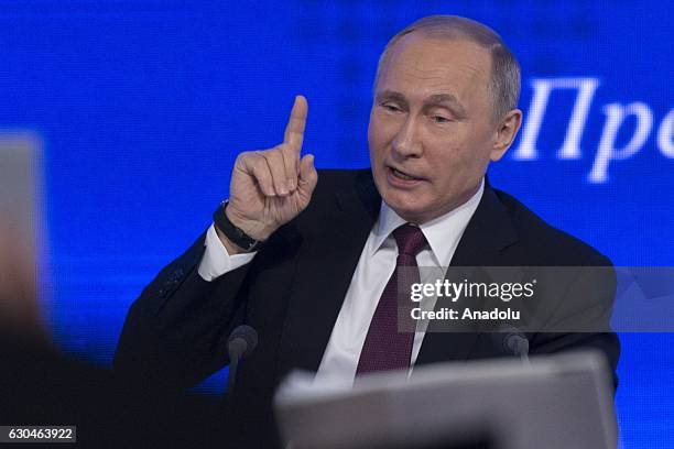 Russia's President Vladimir Putin speaks during his annual end-of-year news conference at Moscow's World Trade Centre in Moscow, Russia, on December...