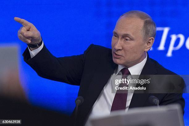 Russia's President Vladimir Putin speaks during his annual end-of-year news conference at Moscow's World Trade Centre in Moscow, Russia, on December...