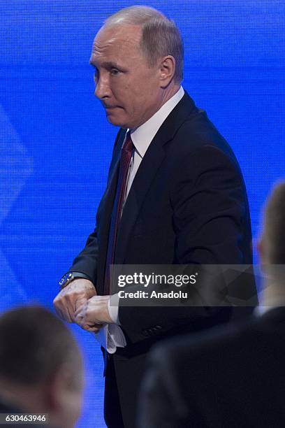 Russia's President Vladimir Putin gestures after his annual end-of-year news conference at Moscow's World Trade Centre in Moscow, Russia, on December...