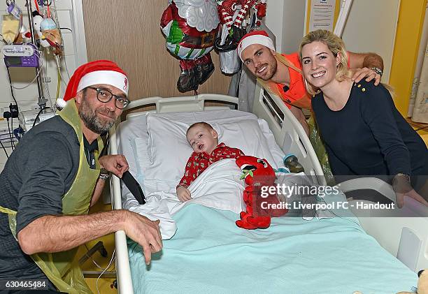 Jurgen Klopp manager and Jordan Henderson Captain of Liverpool at Alder Hey Children's Hospital on December 23, 2016 in Liverpool, England.