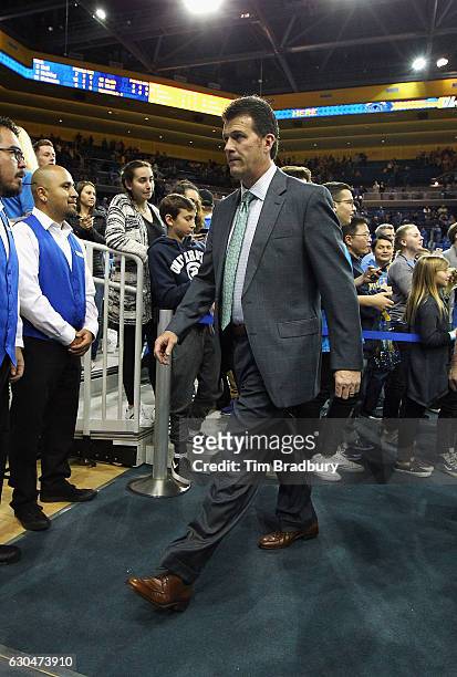 Head coach Steve Alford of the UCLA Bruins leaves the court after defeating the Western Michigan Broncos 82-68 at Pauley Pavilion on December 21,...