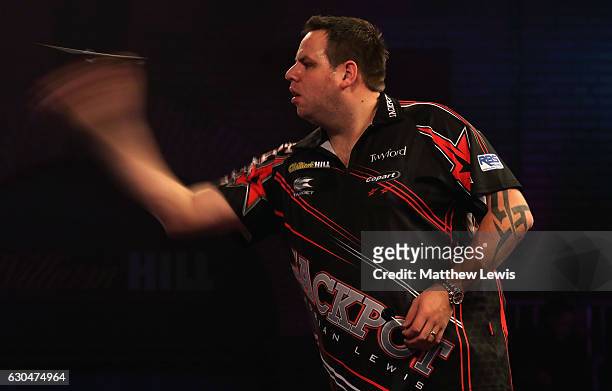 Adrian Lewis of Great Britain in action against Joe Cullen of Great Britain during day nine of the 2017 William Hill PDC World Darts Championships at...