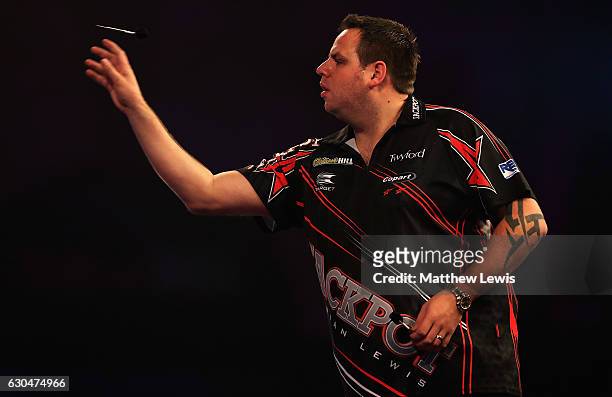 Adrian Lewis of Great Britain in action against Joe Cullen of Great Britain during day nine of the 2017 William Hill PDC World Darts Championships at...
