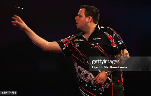 Adrian Lewis of Great Britain in action against Joe Cullen of Great Britain during day nine of the 2017 William Hill PDC World Darts Championships at...