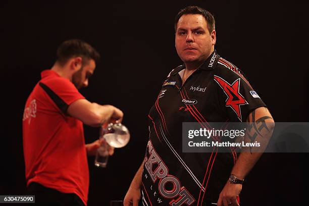 Adrian Lewis of Great Britain looks on, during his match against Joe Cullen of Great Britain during day nine of the 2017 William Hill PDC World Darts...