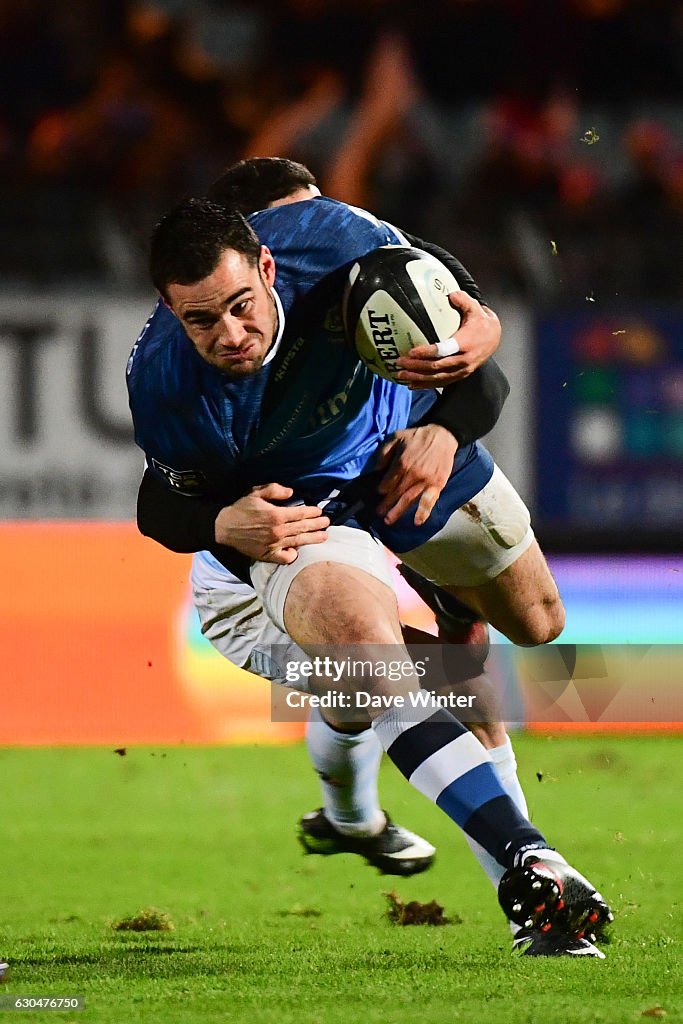 Palis Racer Geoffrey Palis of Castres and Brice Dulin of Racing 92 during the Top ...