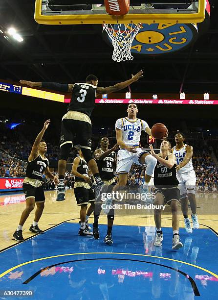 Lonzo Ball of the UCLA Bruins drives to the basket during the first half against the Western Michigan Broncos at Pauley Pavilion on December 21, 2016...