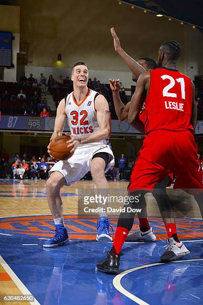 Marshall Plumlee of the Westchester Knicks drives against CJ Leslie of the Raptors 905 on December 23, 2016 at the Westchester County Center in White...