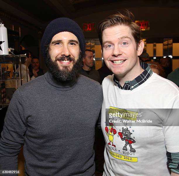 Josh Groban and Rory O'Malley during the cast of 'Hamilton' 2016 Door Decorating Competition at Richard Rodgers Theatre on December 23, 2016 in New...
