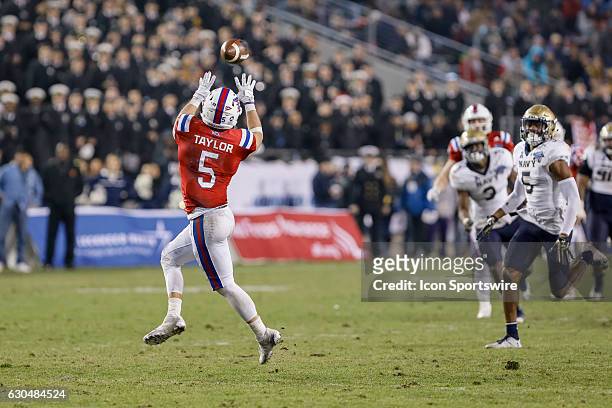 Louisiana Tech Bulldogs wide receiver Trent Taylor makes a reception during the Armed Forces Bowl between the Navy Midshipmen and Louisiana Tech...