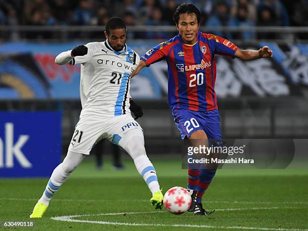 Eduardo Neto of Kawasaki Frontale and Ryoichi Maeda of FC Tokyo compete for the ball during the 96th Emperor's Cup quarter final match between FC...