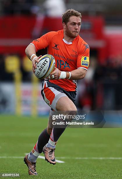 Alex Tait of Newcastle Falcons in action during the Aviva Premiership match between Saracens and Newcastle Falcons at Allianz Park on December 24,...