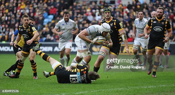 Dave Attwood of Bath dives over for their second try during the Aviva Premiership match between Wasps and Bath Rugby at The Ricoh Arena on December...