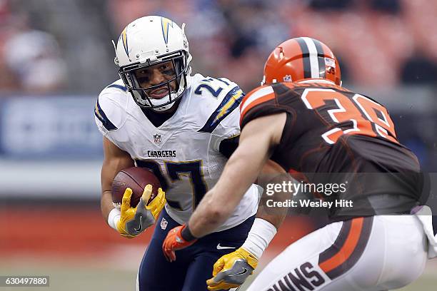 Kenneth Farrow of the San Diego Chargers rushes against Ed Reynolds of the Cleveland Browns at FirstEnergy Stadium on December 24, 2016 in Cleveland,...