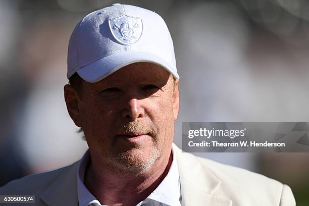 Oakland Raiders owner Mark Davis stands on the field prior to their NFL game against the Indianapolis Colts at Oakland Alameda Coliseum on December...