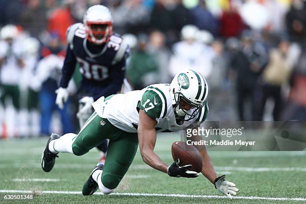 Charone Peake of the New York Jets reaches for an incomplete pass during the first half against the New England Patriots at Gillette Stadium on...