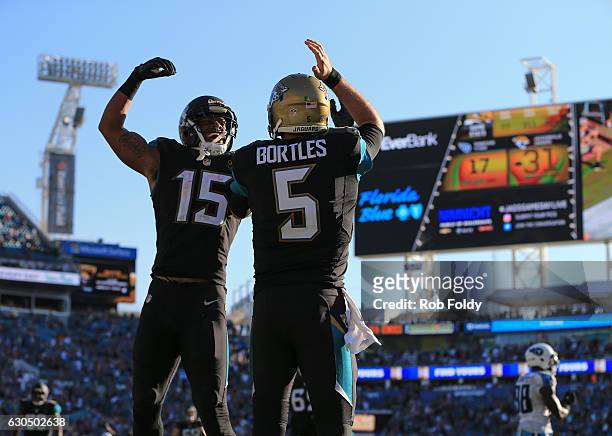 Blake Bortles of the Jacksonville Jaguars celebrates with Allen Robinson after scoring a touchdown off a pass from Marquise Leeduring the fourth...