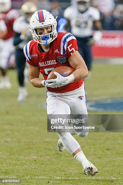 Louisiana Tech Bulldogs wide receiver Trent Taylor catches a 51 yard touchdown pass late in the first half of the Armed Forces Bowl between the Navy...