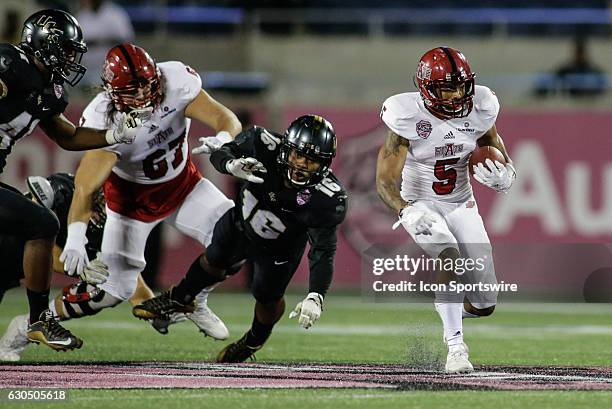 Arkansas State Red Wolves running back Daryl Rollins-Davis runs for a gain during the AutoNation Cure Bowl on December 17 at Camping World Stadium in...